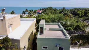 Placencia in September: Weather, Rates, and What to Do 3 Placencia, Belize — aerial / beach view used in September travel guide