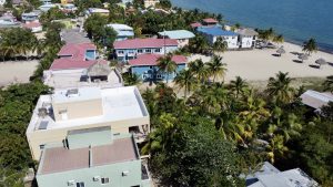 Placencia in November: Weather, Rates, and What to Do 1 Placencia, Belize — aerial / beach view used in January travel guide
