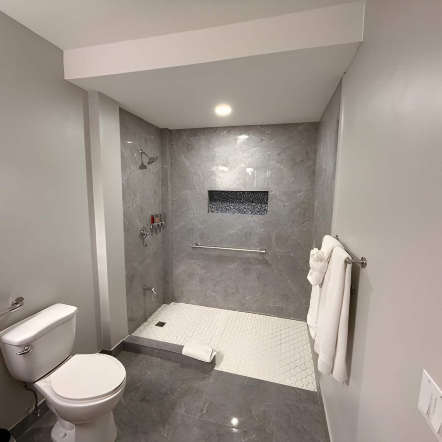 Hummingbird Room bathroom with toilet and vanity